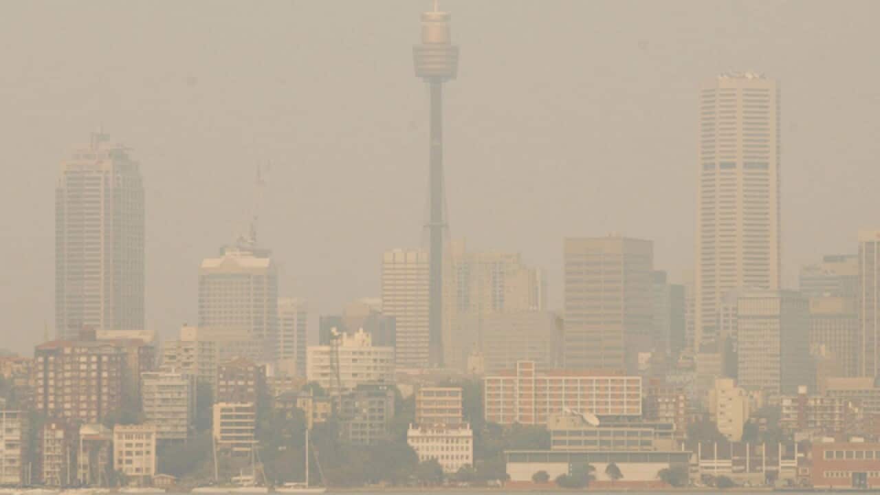 Centerpoint Tower disappears into the smoke haze