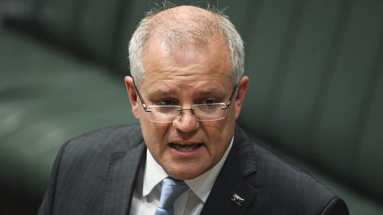 Australian Prime Minister Scott Morrison speaks during House of Representatives Question Time at Parliament House in Canberra, Wednesday, April 8, 2020. (AAP Image/Lukas Coch) NO ARCHIVING