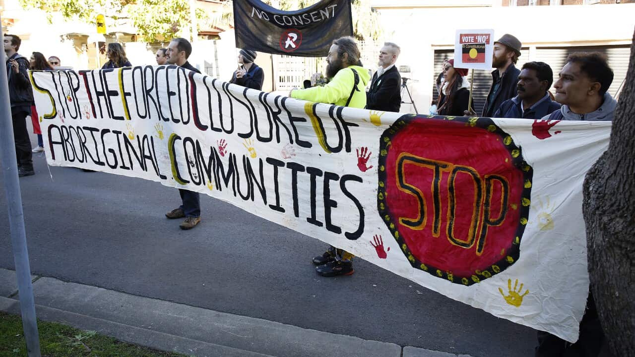 Protestors outside the NAIDOC meeting. (AAP)