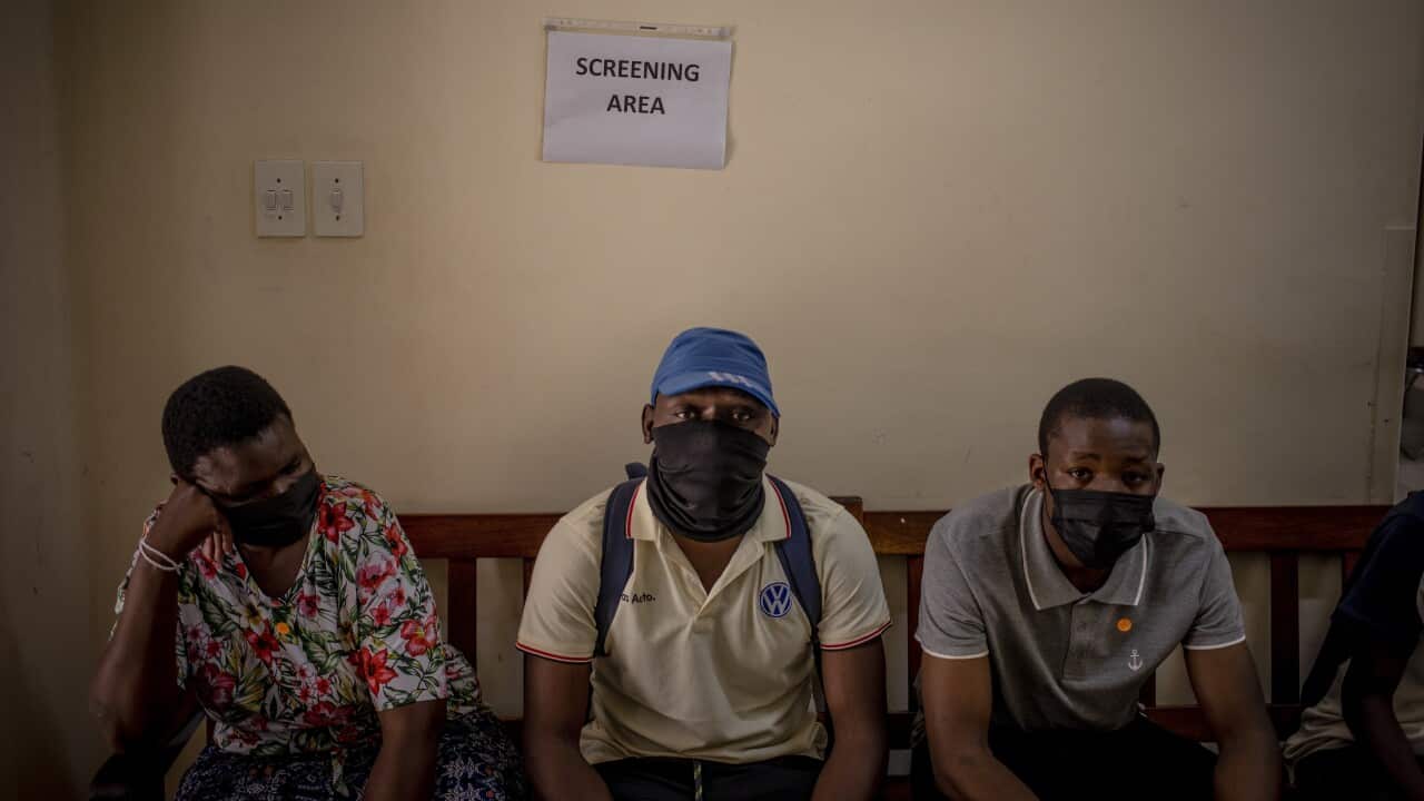 Citizens line up for a vaccine at a government-run clinic in Hillbrow, Johannesburg.