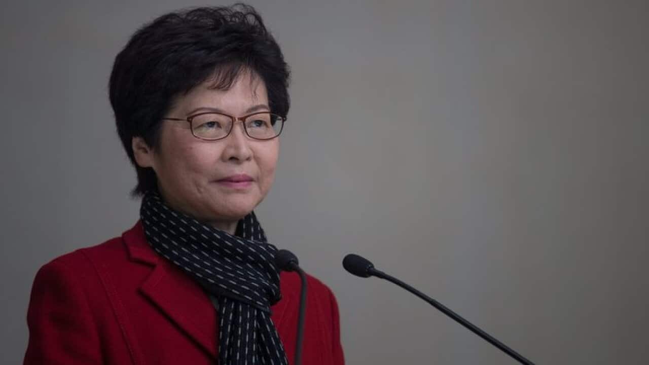Hong Kong Chief Executive-designate Carrie Lam looks on during a press conference.