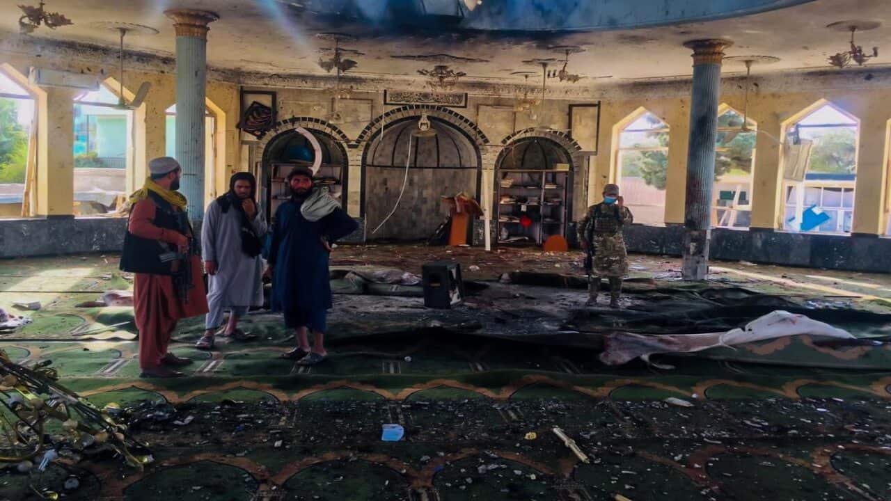 Taliban inspect the scene of a bomb blast that targeted a Shiite Muslims mosque in Kunduz, Afghanistan, 08 October 2021.
