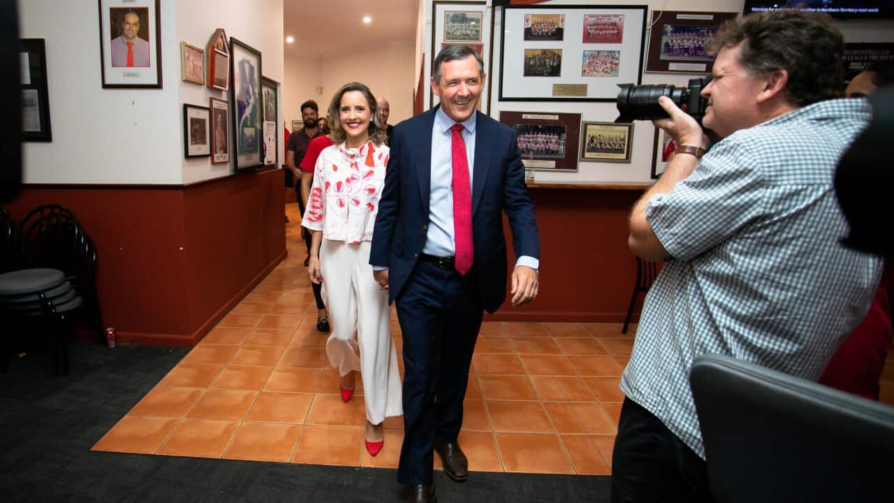 NT Chief Minister Michael Gunner arrives with wife Kristy O'Brien