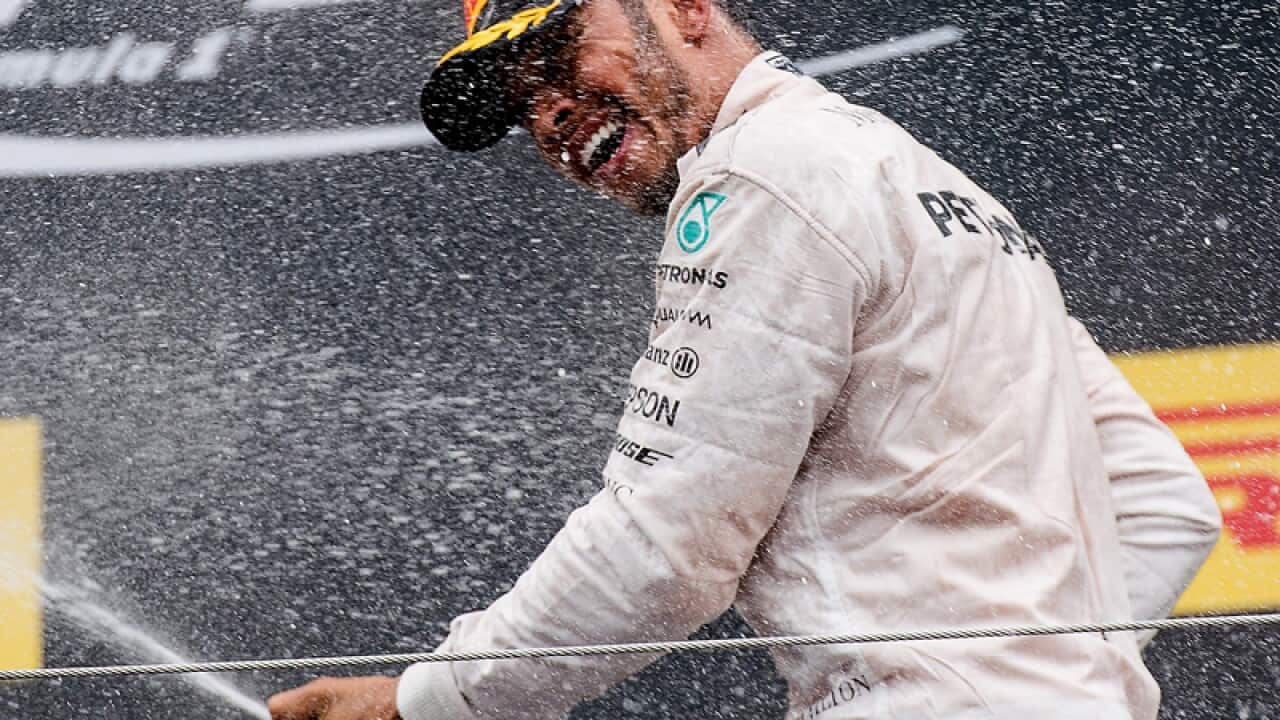 Lewis Hamilton on the podium in Spielberg
