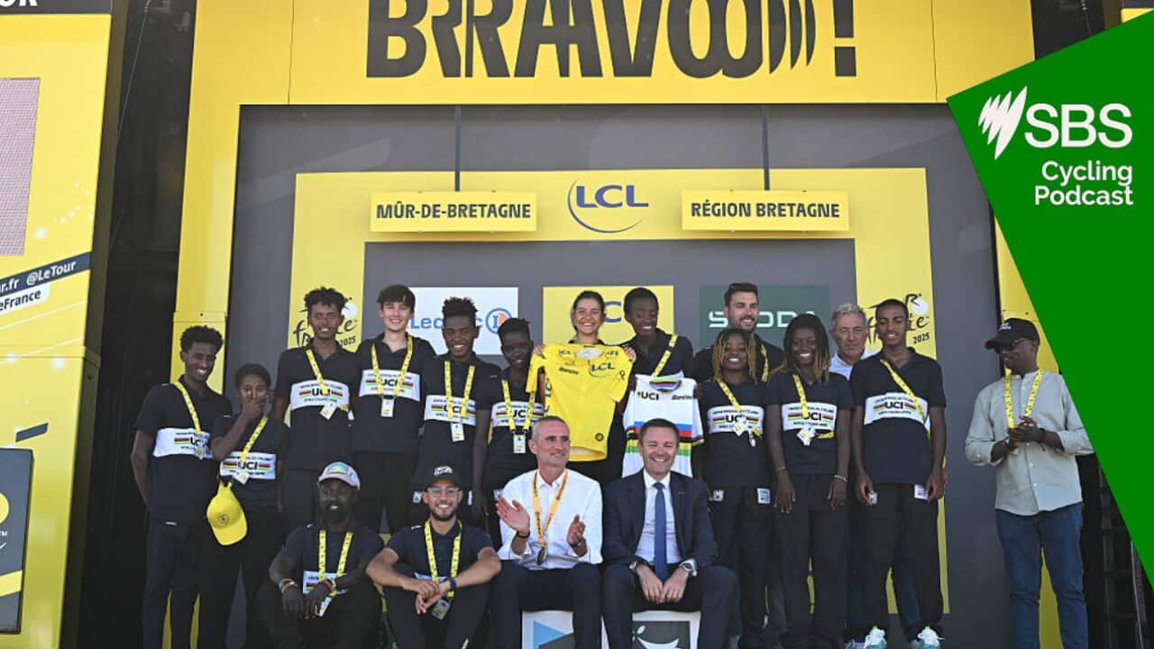 MUR-DE-BRETAGNE - GUERLEDAN, FRANCE - JULY 11: African Riders delegation from the Rwanda 2025 World Championships committee pose on the final podium alongside David Lappartient (C), President of the UCI and President of the Rwanda Cycling Federation, Samson Ndayishimiye (L) after the 112th Tour de France, Stage 7 a 197km stage from Saint-Malo to Mur-de-Bretagne (Guerledan) / #UCIWT / on July 11, 2025 in Saint-Malo, France. (Photo by Tim de Waele/Getty Images)