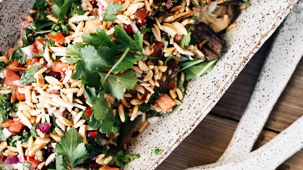 Eggplant with tahini, pomegranate and tomato salsa