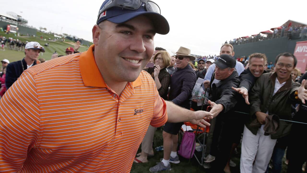 American Kevin Stadler celebrates winning his first PGA title