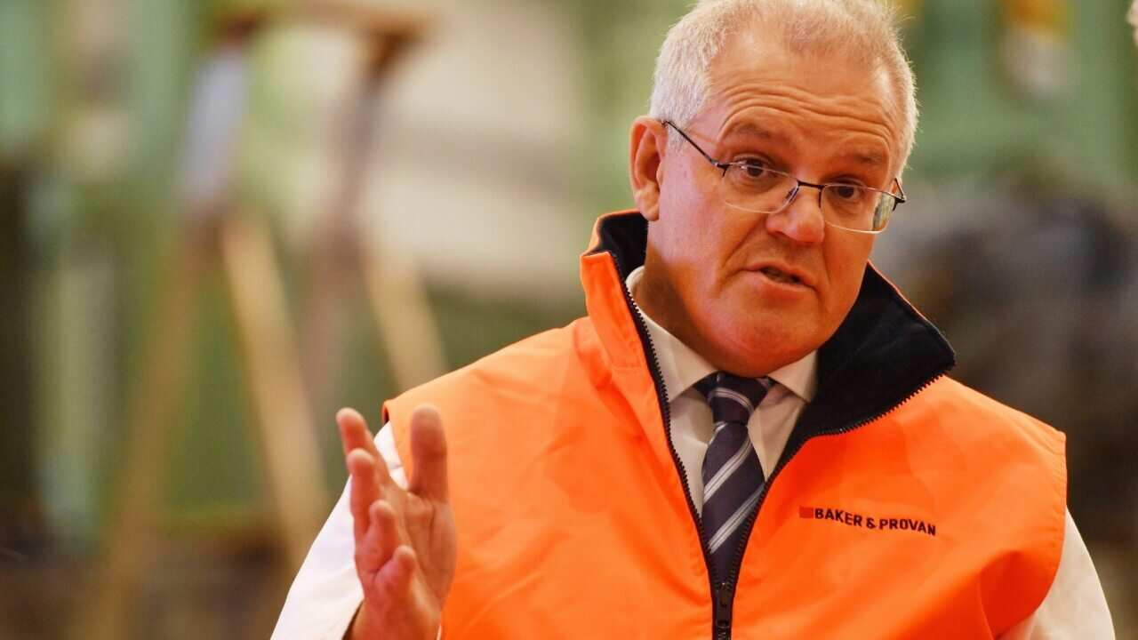 Scott Morrison, visiting a factory in Sydney, says coal mining has a future in Australia.