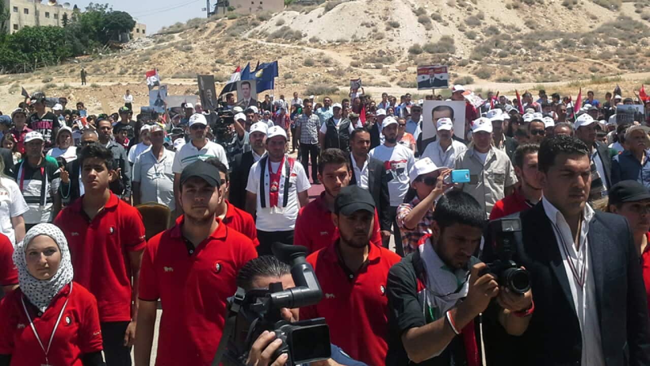 Supporters of Syrian President Bashar al-Assad
