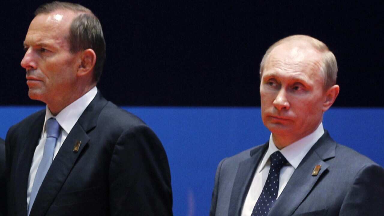 Prime Minister Tony Abbott (L) and Russian President Vladimir Putin