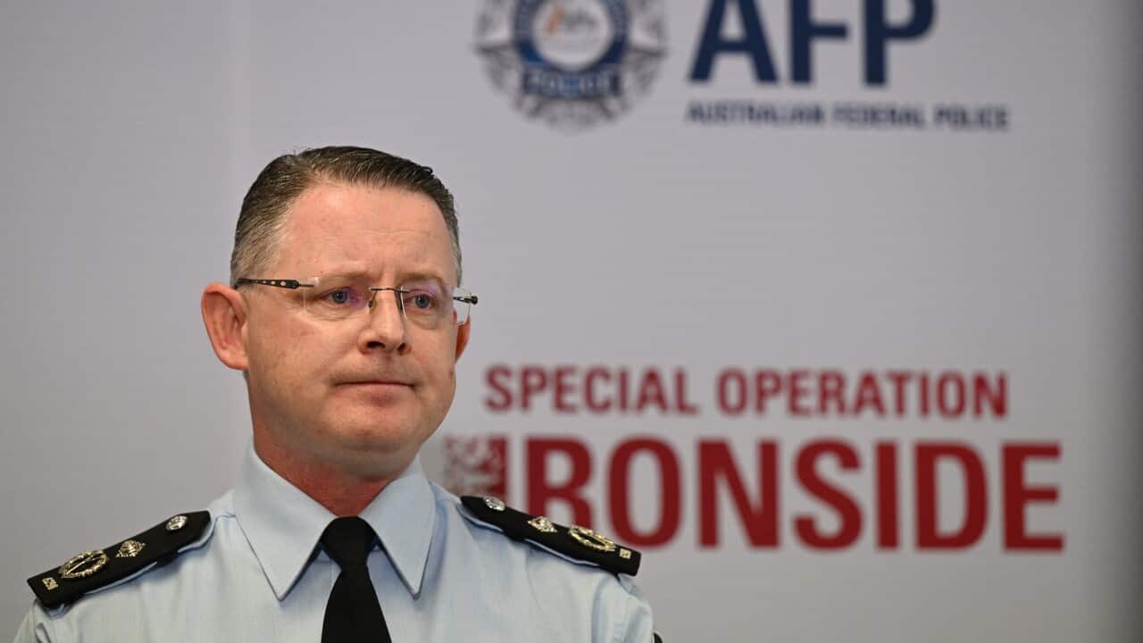 Australian Federal Police Assistant Commissioner Nigel Ryan looks at the camera.
