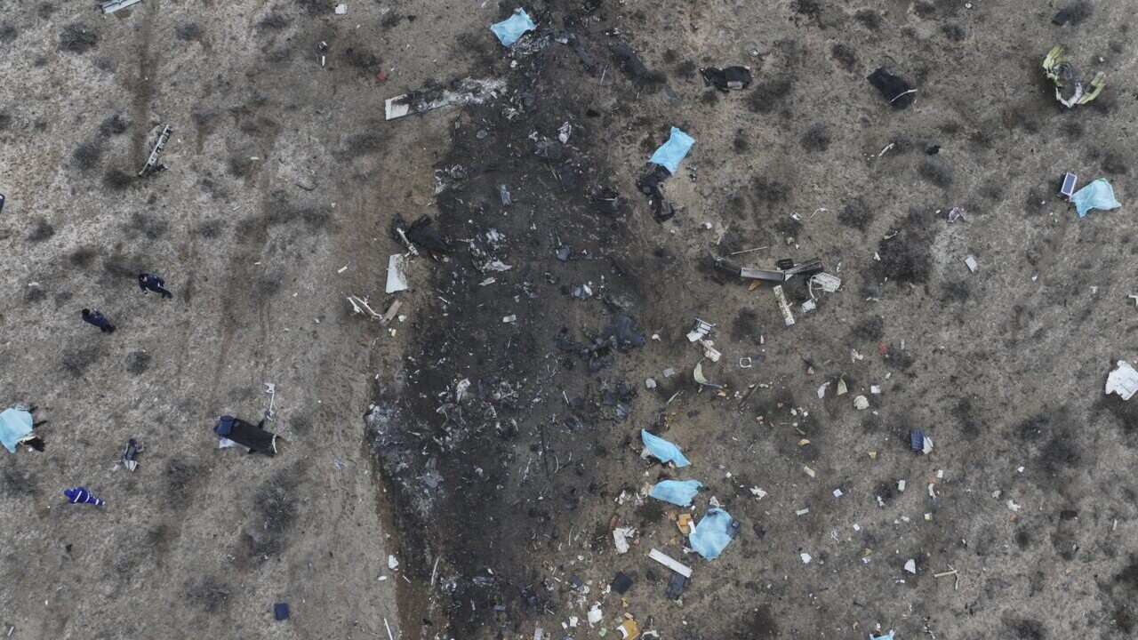 Debris at the crash site of a passenger plane.