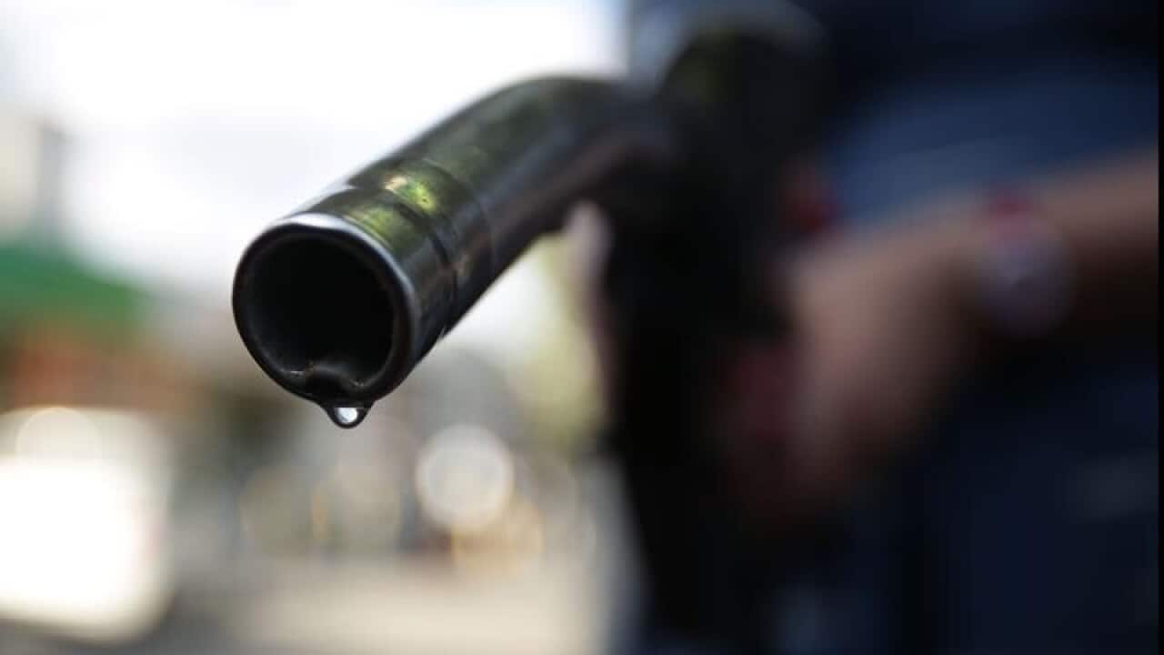 A car being filled up at a petrol station