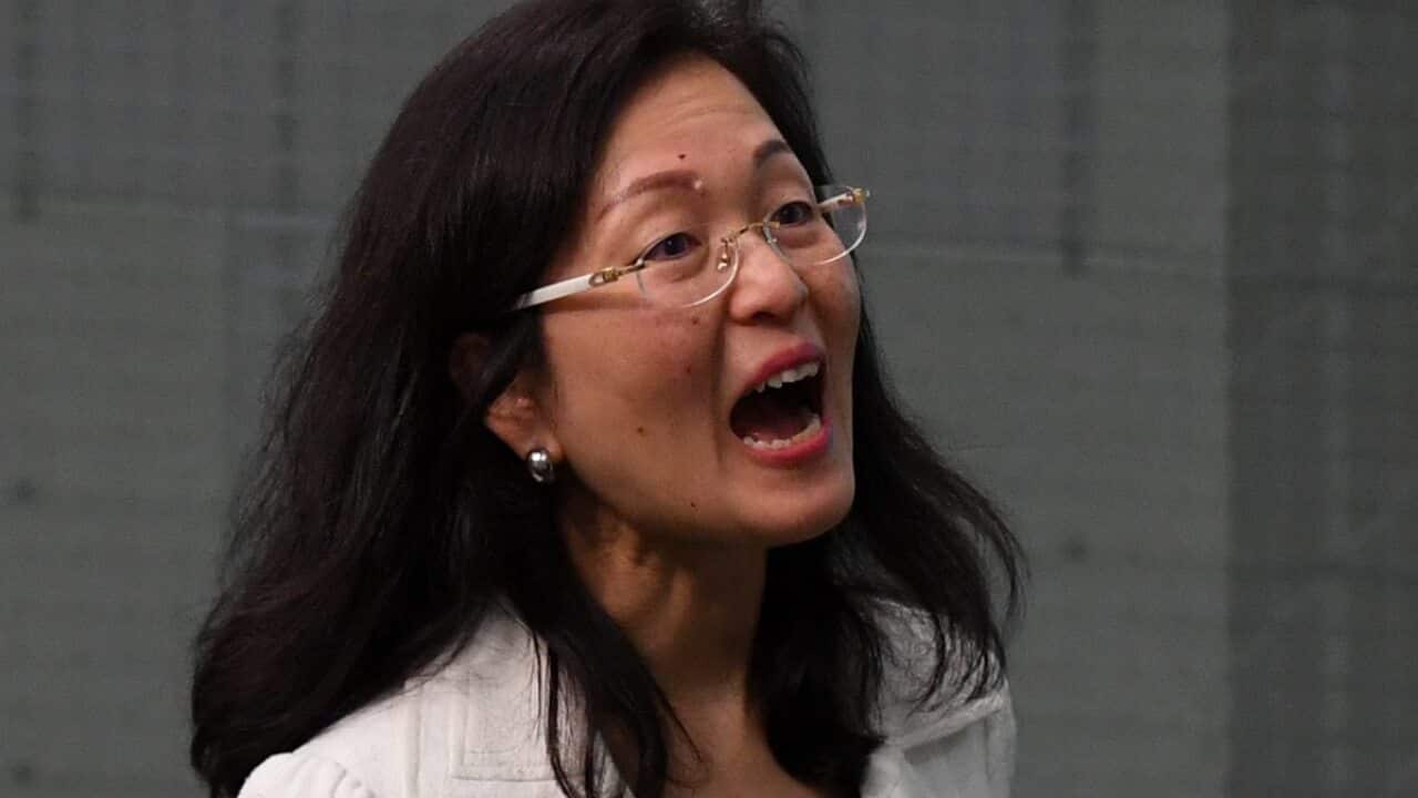 Liberal MP Gladys Liu reacts during Question Time at Parliament
