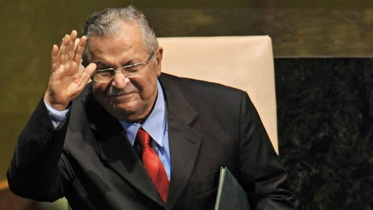 President Jalal Talabani waving