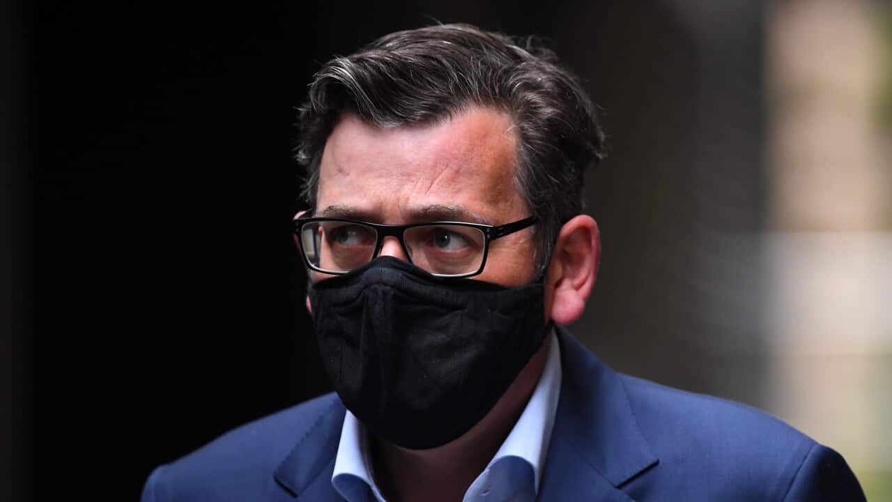 Victorian Premier Daniel Andrews arrives at a press conference in Melbourne on Tuesday.
