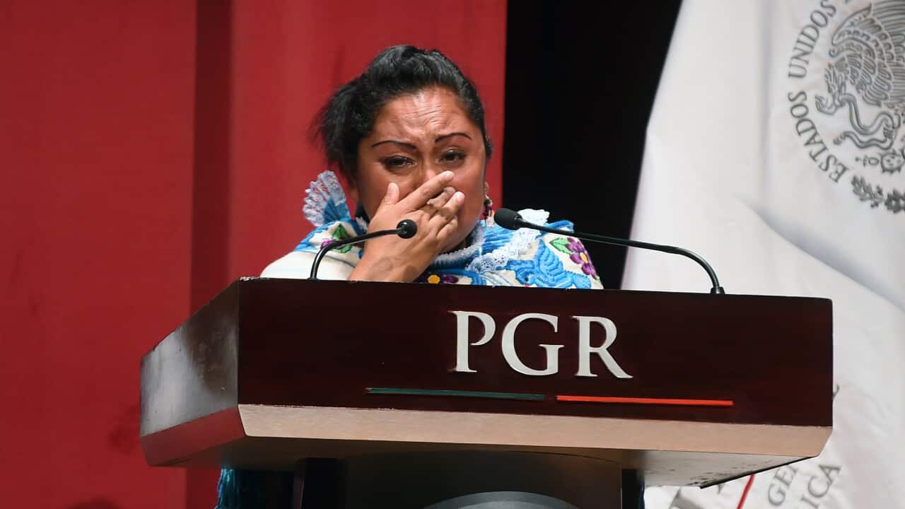 Hnahnu indigenous woman Alberta Alcantara gets moved as she delivers a speech.