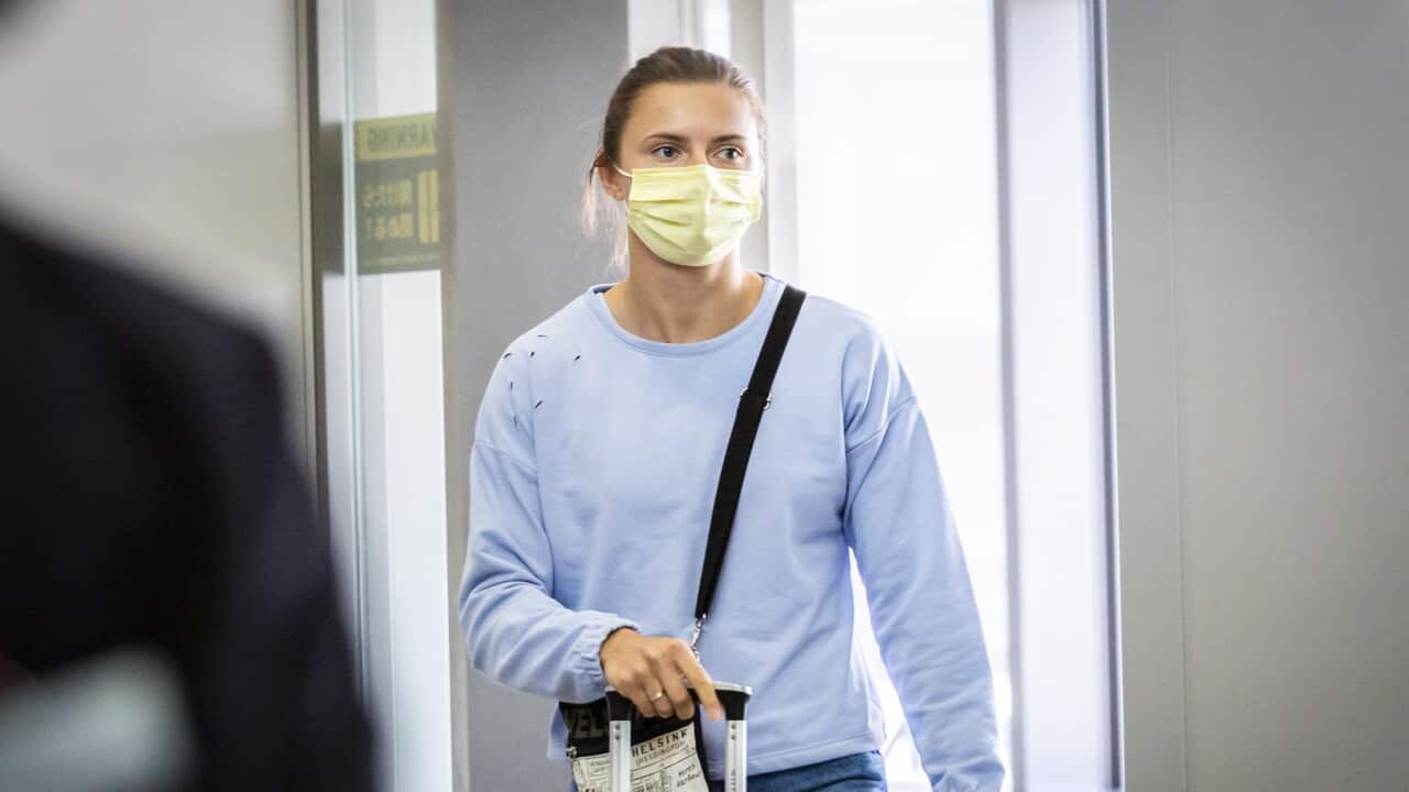 Belarus athlete Krystsina Tsimanouskaya arrives to board Austrian Airlines 0S52 at Narita international airport on 4 August, 2021 in Tokyo, Japan.