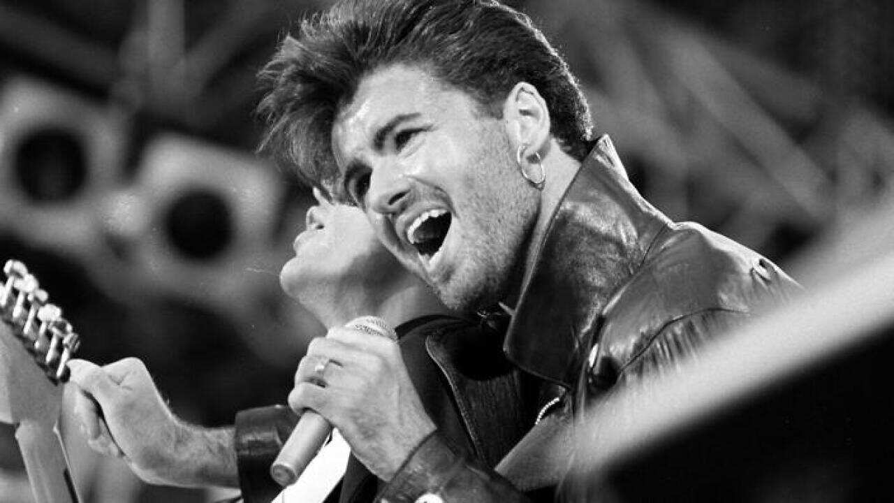 George Michael on stage for Wham's last sell out concert at Wembley Stadium in London