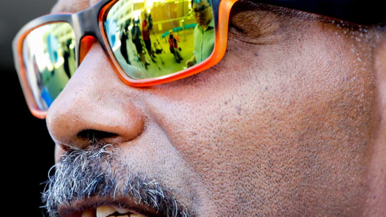 Lex Wotton outside the Federal Court, Townsville, Monday, Dec. 5, 2016. A federal court judge has found Queensland police were unlawfully discriminatory after a high-profile Aborignal death in custody in 2004. (AAP Image/Cameron Laird) NO ARCHIVING