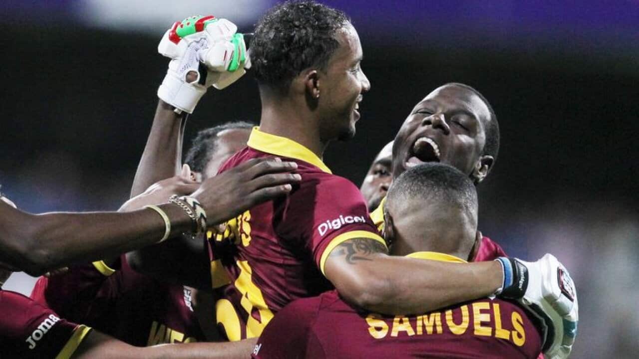 West Indies Lendl Simmons is held aloft by teammates as they celebrate their seven wicket win over India at the ICC World Twenty20 2016 cricket semifinal match