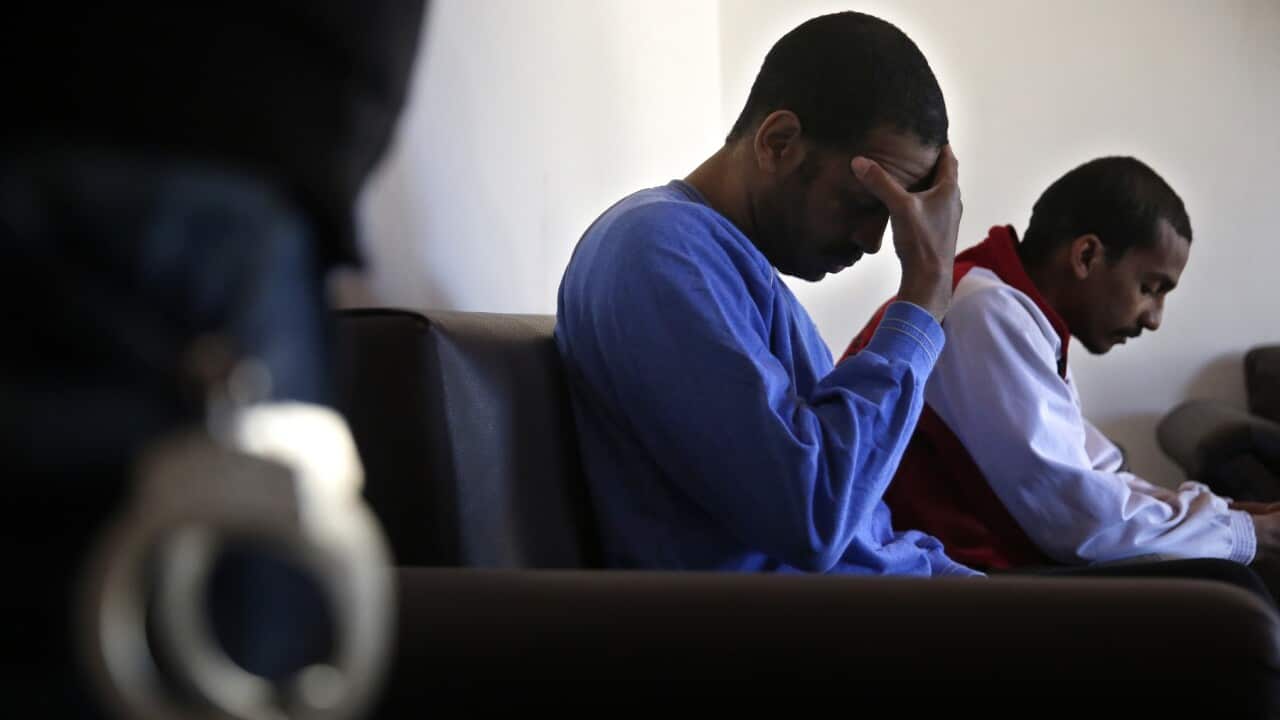 File photo of Alexanda Amon Kotey (L) and El Shafee Elsheikh, who face terrorism charges in the US