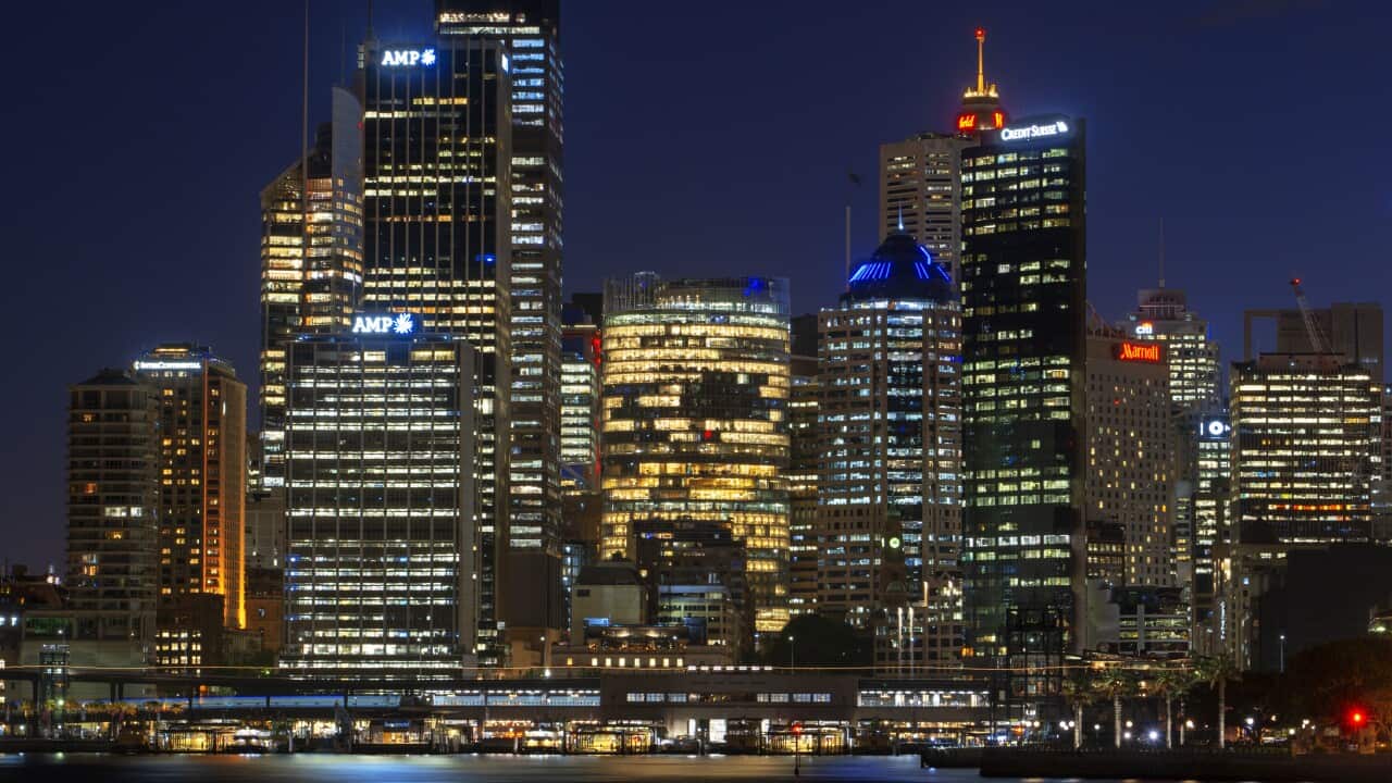 February 2020 - Architecture. First line of buildings in Sydney city CBD at sunset. Illuminated arch of the bridge reflecting in blurred waters Sydney, New South Wales, Australia (Photo by Sergi Reboredo/Sipa USA)