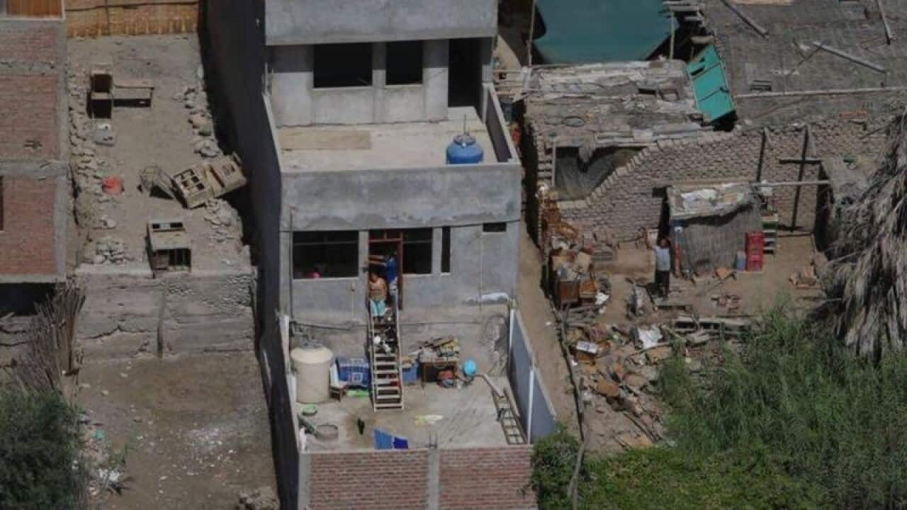 Collapsed homes after the earthquake hit southern Peru