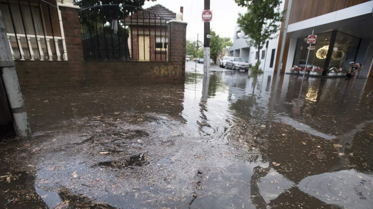 The corner of Buncle street and Alfred street in North Melbourne is seen covered in water on Tuesday, 19 December, 2017. 