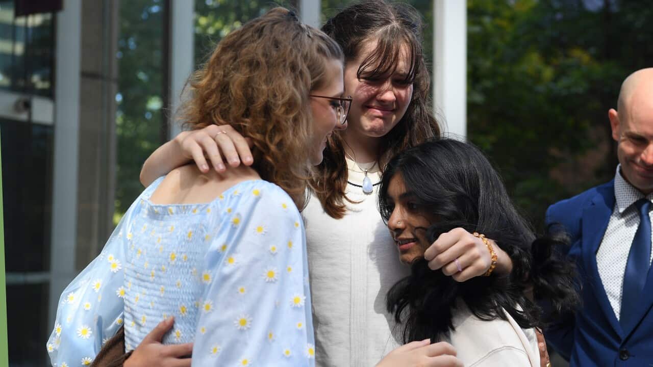 (lt-rt) Ava Princi, 18, Luca Saunders, 16, and Anjali Sharma, 17, outside the NSW Federal Court in Sydney, Tuesday, March 15, 2022