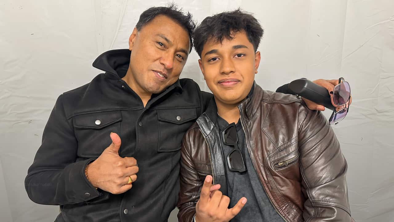 Deepak Bajracharya (L) with his son Deon Bajracharya (R) at Momo Festival Melbourne in Footscray Park on Saturday, 11 April 2026.