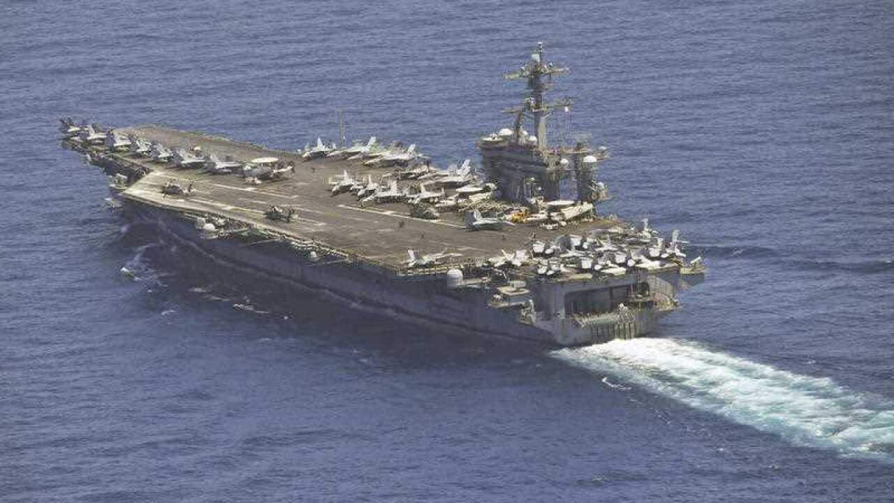 The nuclear-powered aircraft carrier US Carl Vinson sailing in the Tsushima Channel, offshore of Nagasaki Prefecture
