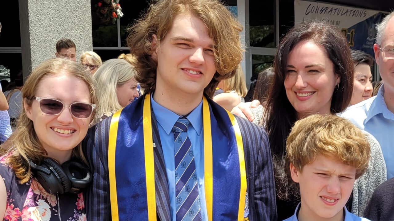 Emmey wearing her school uniform at her Year 12 graduation at Brisbane’s Citipointe Christian College with her siblings and her mother, Janina on the right.