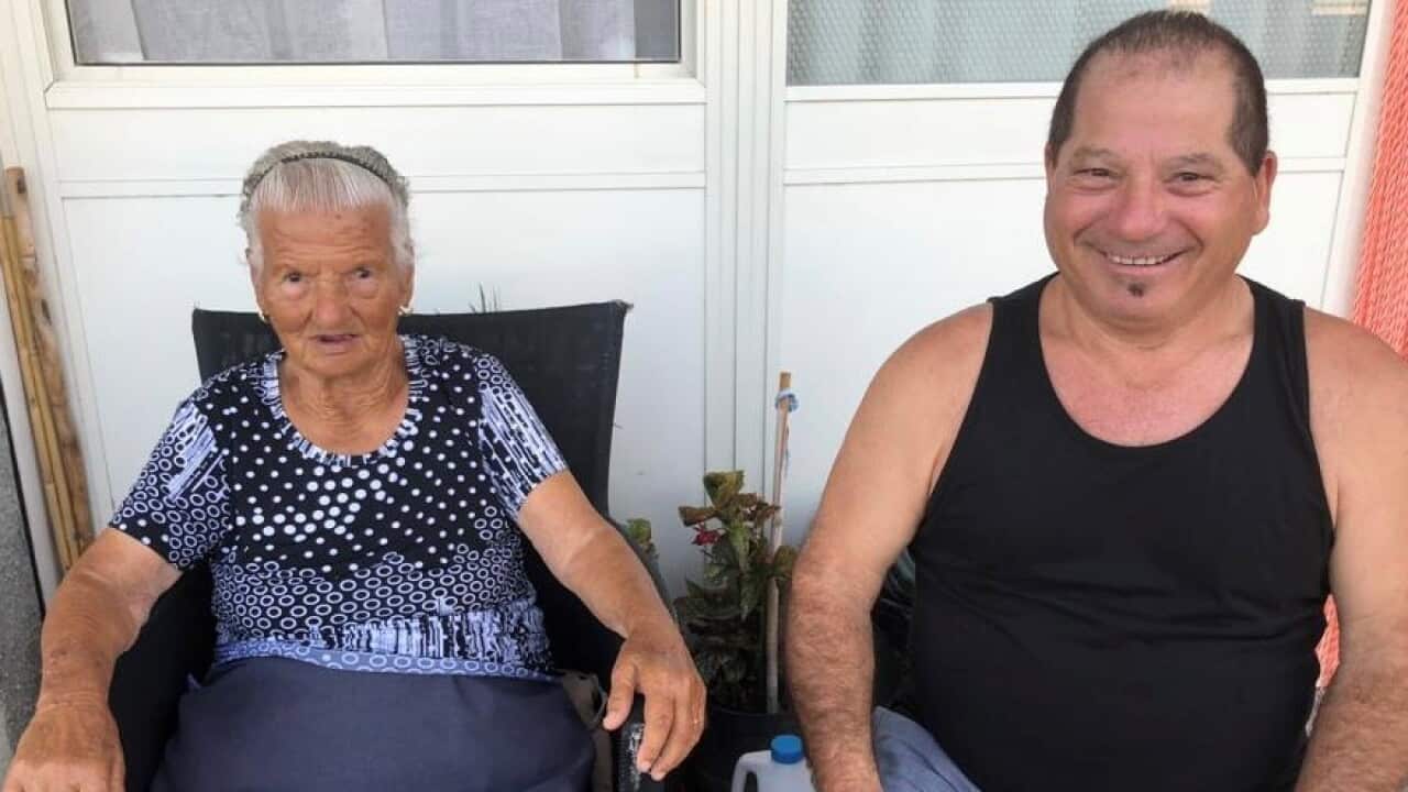 Sam Comitogianni with his mother in 2008.