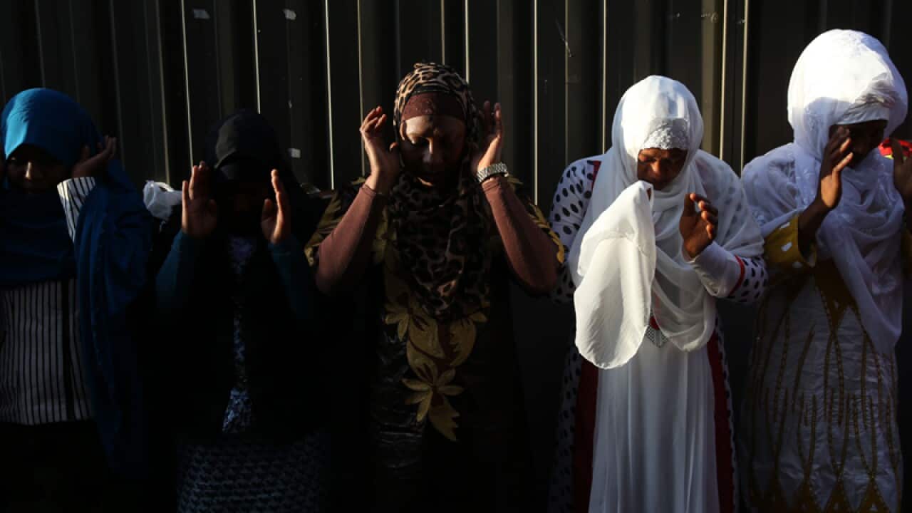 Crowds celebrate the end of the holy month of Ramadan in Sydney