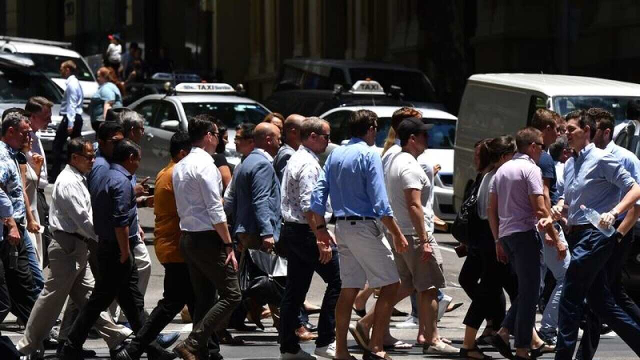Office workers in the central business district of Sydney.