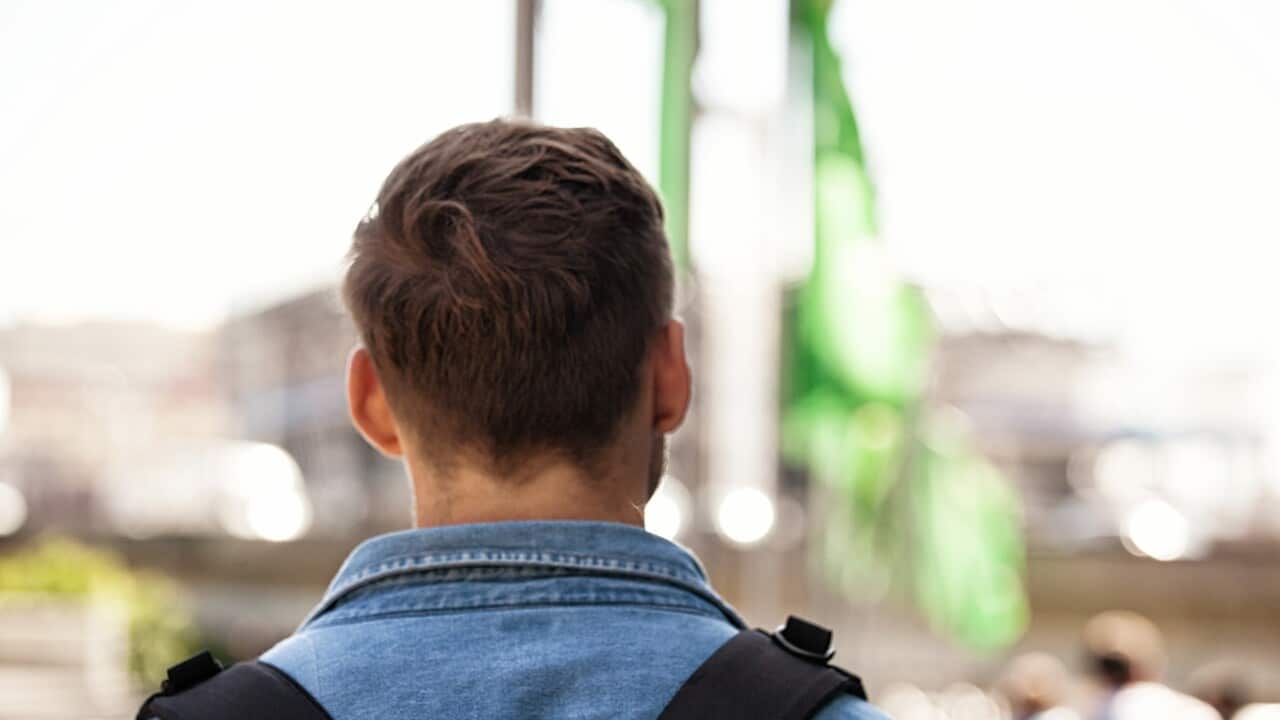 backpacker from behind