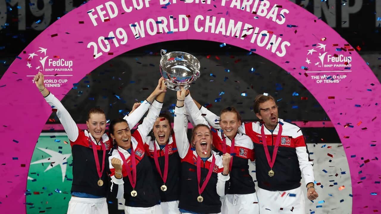 The French team celebrates its Fed Cup win over Australia