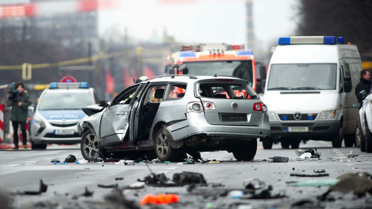 A damaged car on Bismarckstrasse in Berlin