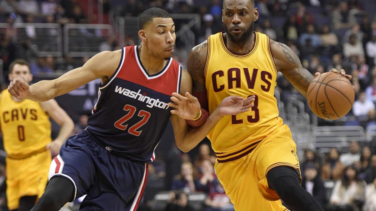 Cleveland Cavaliers forward LeBron James (23) dribbles the ball