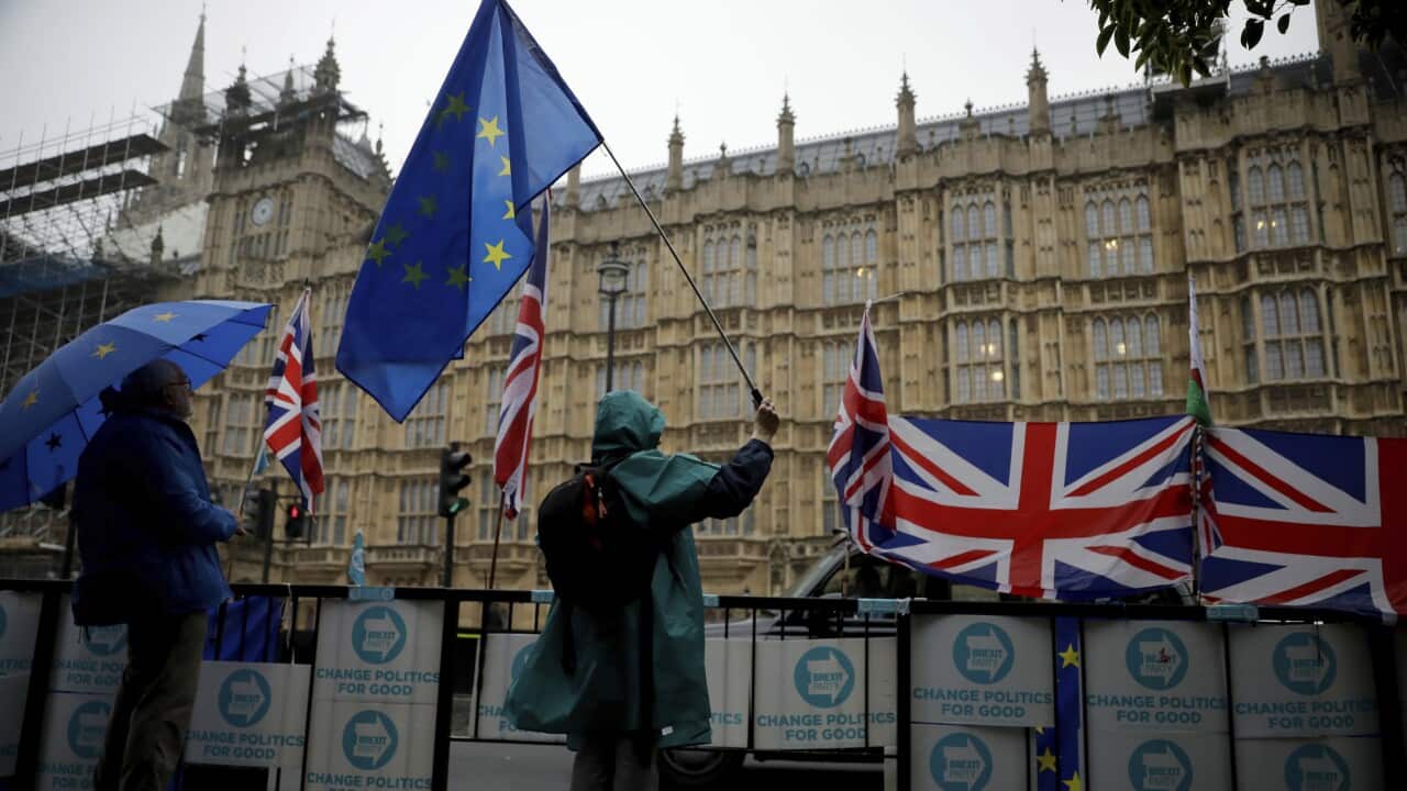 Anti-Brexit remain in the European Union supporters protest outside the Houses of Parliament in London.
