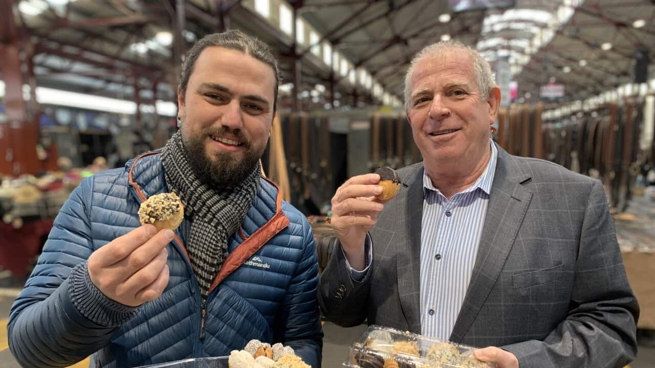 Turkish pastry vendor Tahla Gok (left) with Thrive's Arie Moses (SBS).jpg