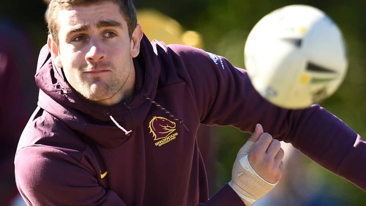 Andrew McCullough is seen with a strapped hand