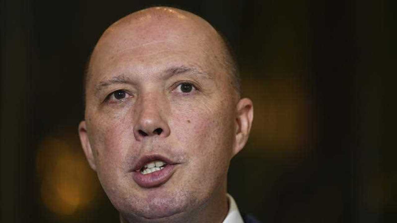 Immigration Minister Peter Dutton in Canberra (AAP)