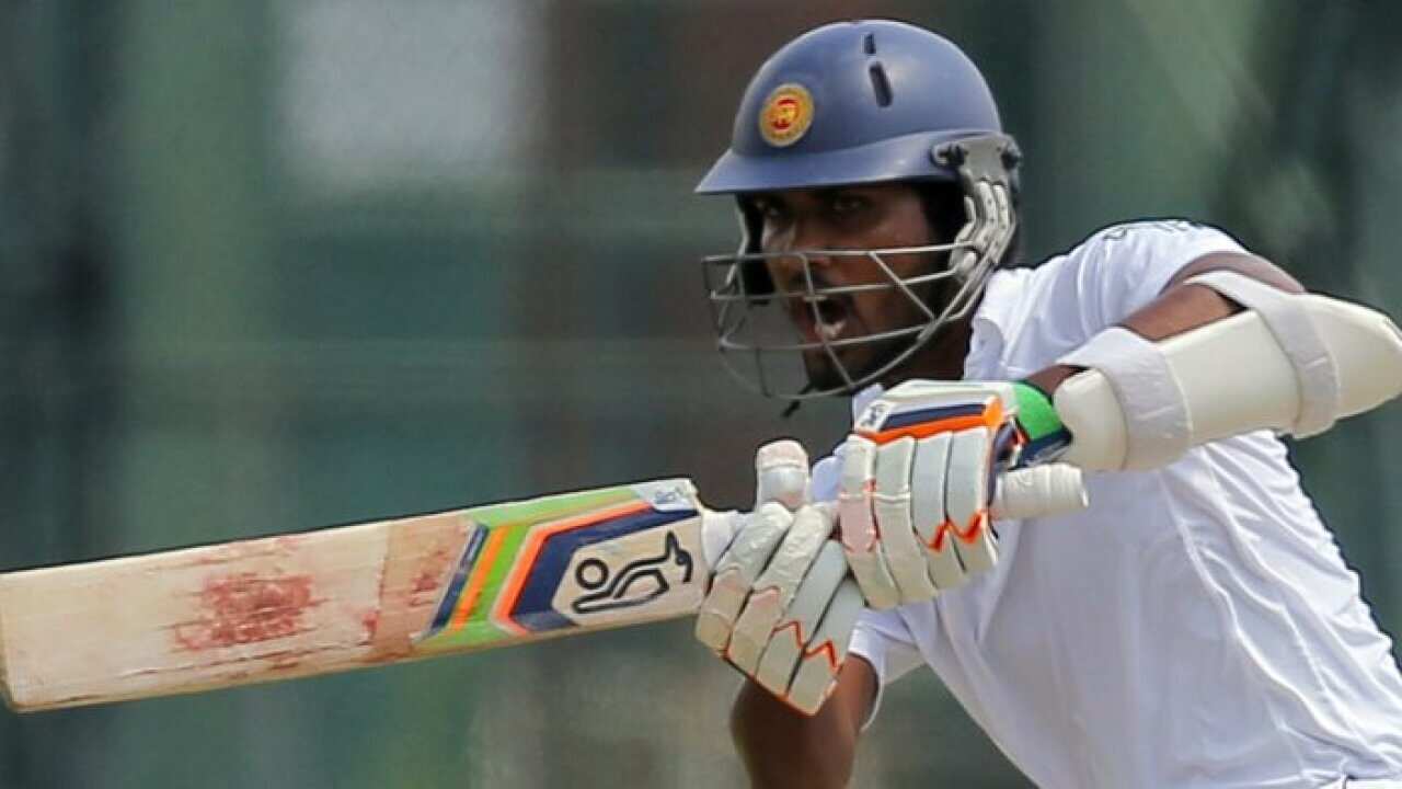 Sri Lanka's Dinesh Chandimal plays a shot during the first day of their second test cricket match with West Indies' in Colombo, Sri Lanka, Thursday, Oct. 22, 2015. (AP Photo/Eranga Jayawardena)