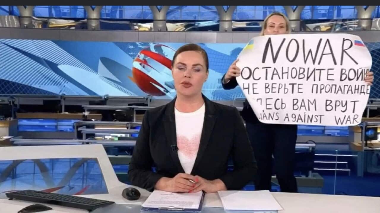 Journalist Crashes Russian Live News Show With Anti-War Poster