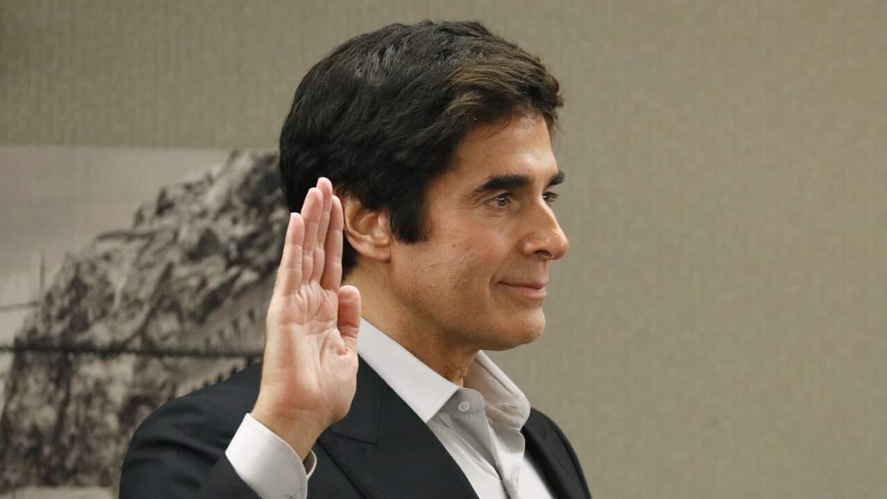 Illusionist David Copperfield is sworn in during court Wednesday, April 18, 2018, in Las Vegas.