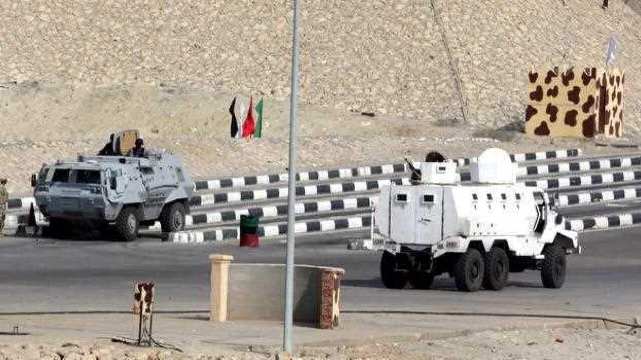 Egyptian security vehicles take up positions as they guard in north sinai, Egypt Egyptian security vehicles take up positions as they guard in north sinai, Egypt