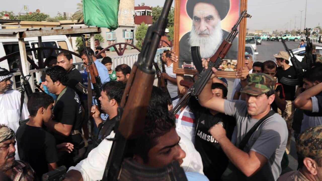 Iraq fighters on the street.