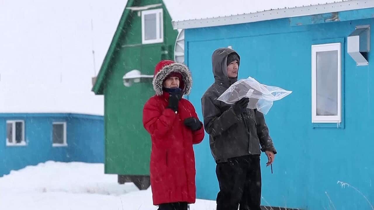 US Census workers finding their way around Toksook Bay